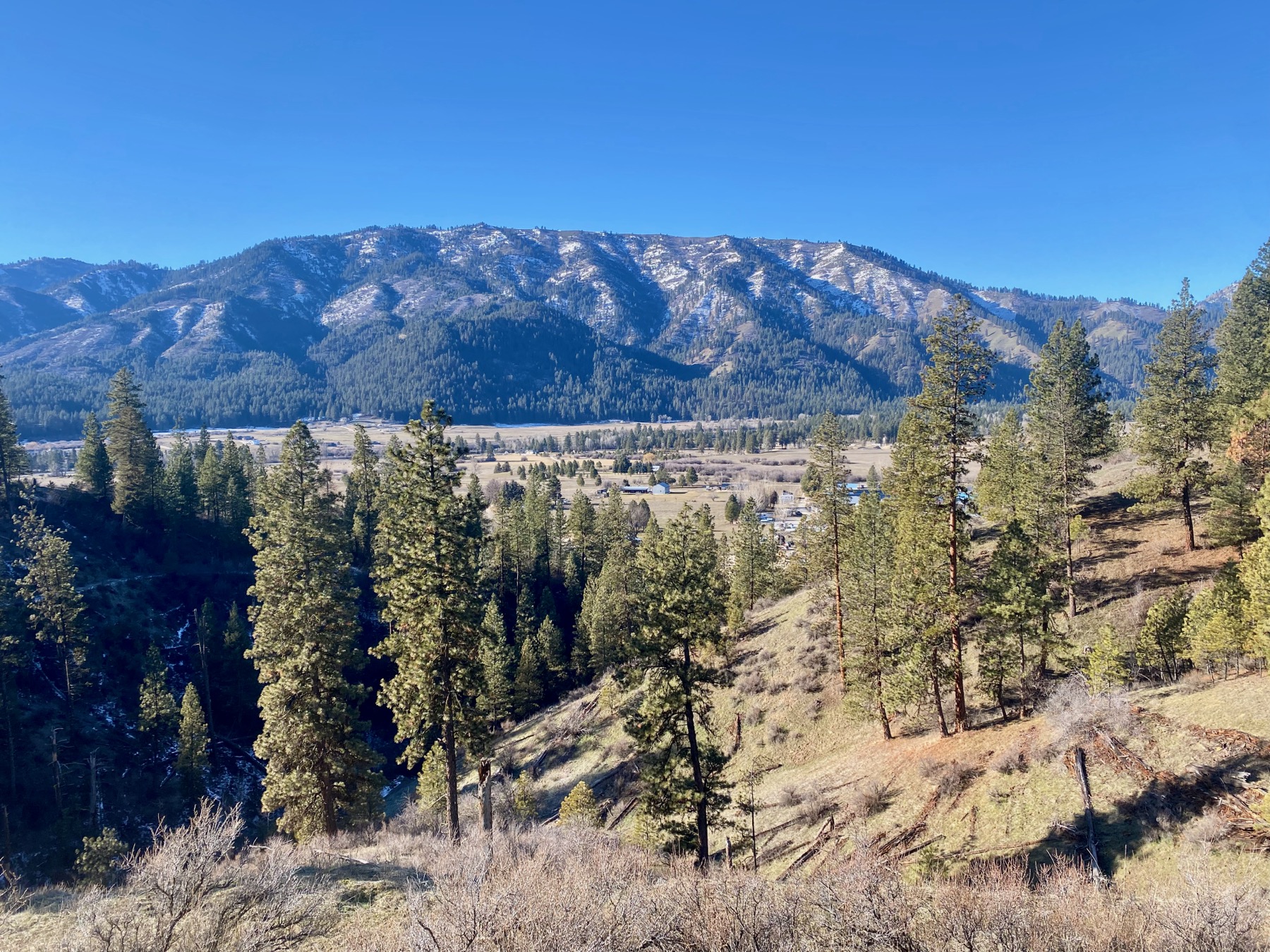 Snow-capped mountain ridgeline above the Garden Valley area